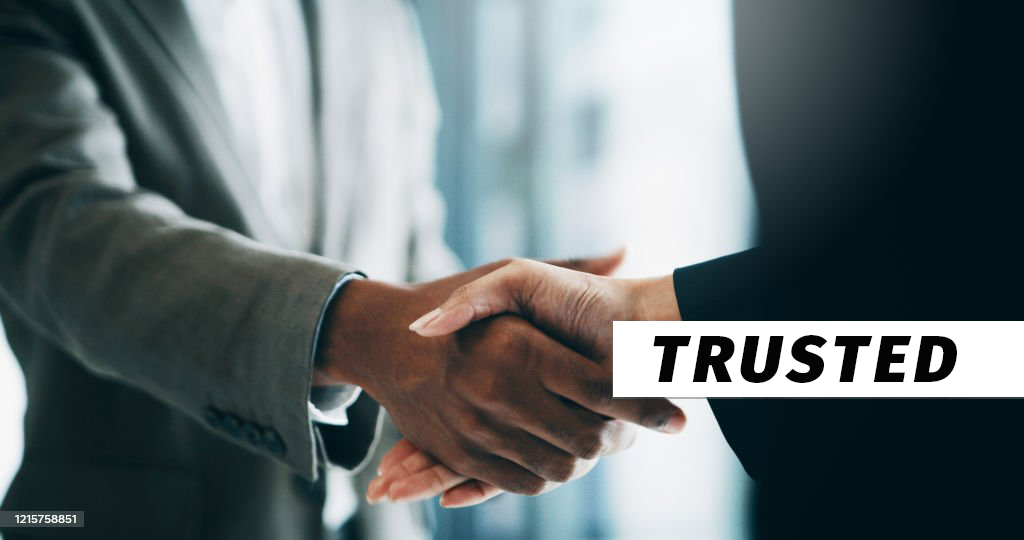 Closeup shot of two unrecognisable businesspeople shaking hands in an office